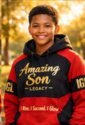 Smiling young man with wearing a hoodie with Amazing son legacy on it