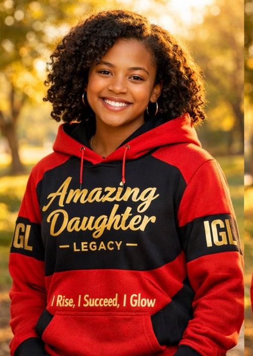 Person wearing a red and black hoodie with 'Amazing Daughter' text, standing outdoors.