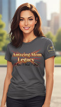 Woman wearing a gray t-shirt with 'Amazing Mom Legacy' text and graphic.
